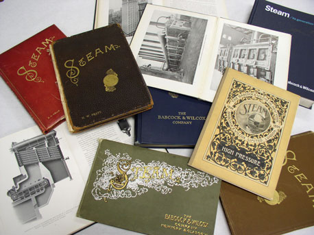 Steam Book editions spread out on table since 1875 Babcock Wilcox