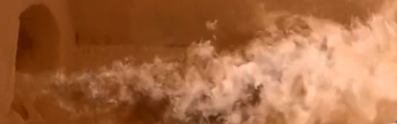 high def camera view inside furnace showing smoke