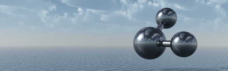 water molecule superimposted over ocean and horizon