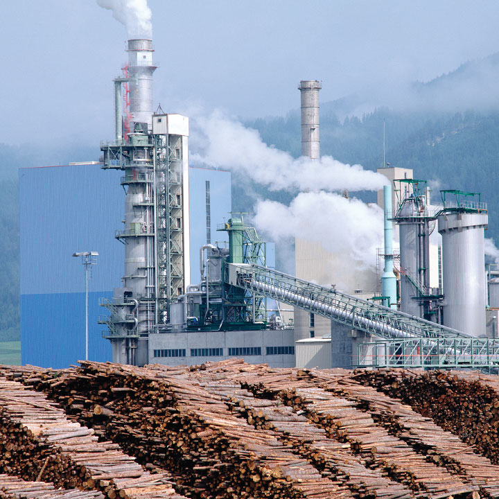 Recovery Boiler at pulp mill with logs in foreground Babcock Wilcox