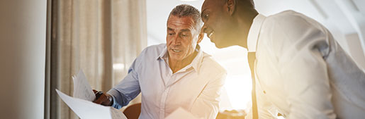 two men reviewing document