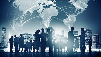 people standing in front of a world map and cityscape