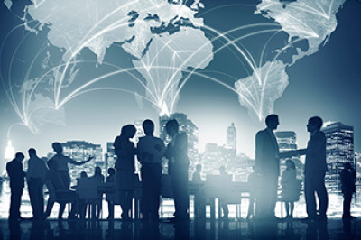 people standing in front of a world map and cityscape