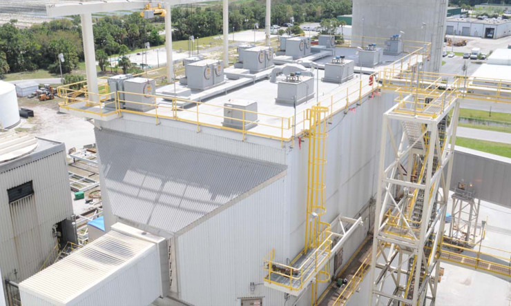 External aerial view of dry electrostatic precipitator with catwalks and caged stairs