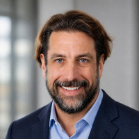 Joseph DeMartino Corporate Headshot in Suit